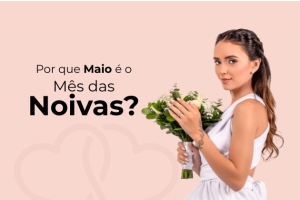 Fundo rosa e à direita mulher branca vestida de noiva segurando um buquê e olhando para frente. À esquerda texto: Por que maio é o mês das noivas?