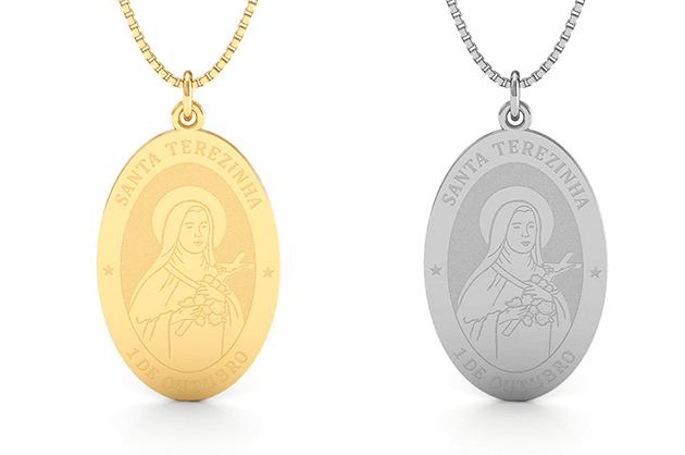 Medalhas de prata e ouro com a imagem de Santa Terezinha e a gravação “1 de outubro”